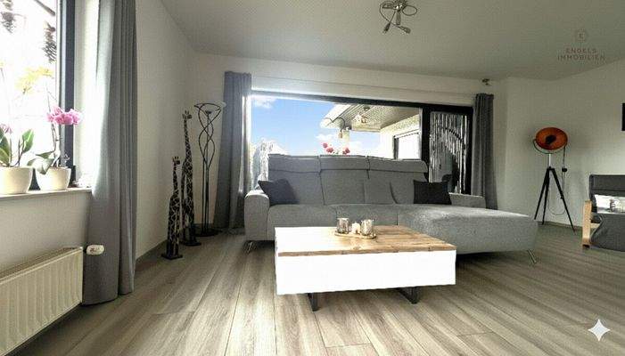 Wohnbereich mit Zugang zur Terrasse