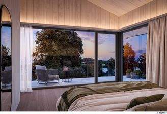 Schlafzimmer mit Seeblick bei Nacht