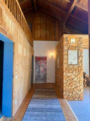 Tenne mit Galerie: Holzlager