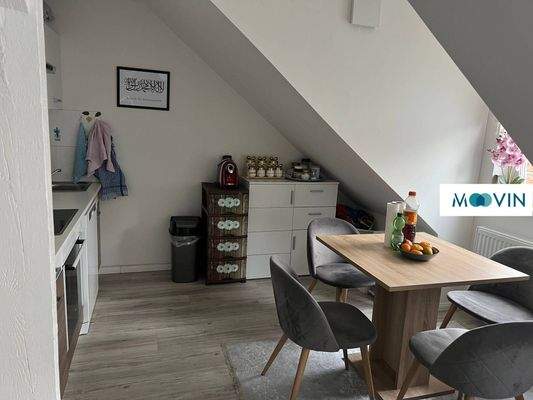 Ansicht IV: Wohn- und Esszimmer mit offenem Küchenbereich