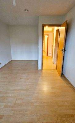 Empty Room with Open Door