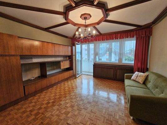 Wohnzimmer mit Ausgang zur Loggia