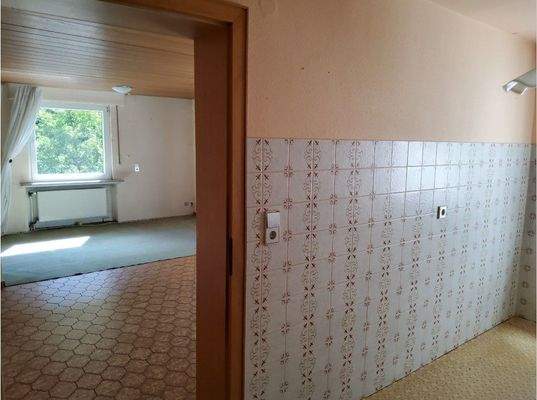 Küche OG1 mit Blick ins Wohnzimmer