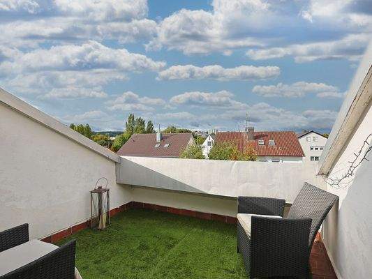 Loggia mit Blick über die Dächer