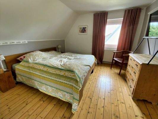 Schlafzimmer mit Echtholzdielen