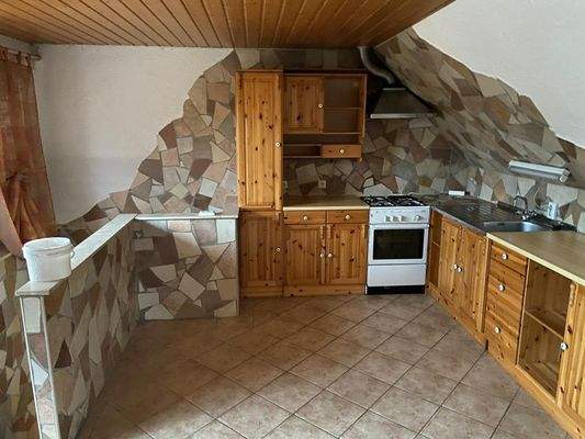 offener Küchen-/Essbereich im Dachgeschoss der 2-Zimmer Wohnung