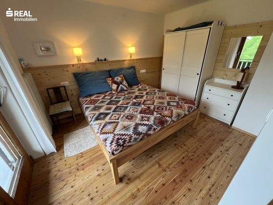 Schlafbereich im Zimmer 3 im Obergeschoss