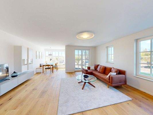 lichtdurchfluteter Wohn-Essbereich mit Kamin