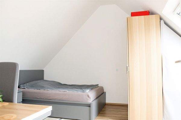 Schlafzimmer Einliegerwohnung - (KI generiert)