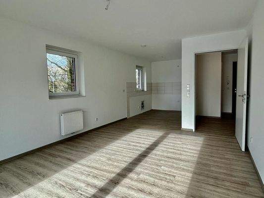 Wohnen und Küche  Beispielfoto 