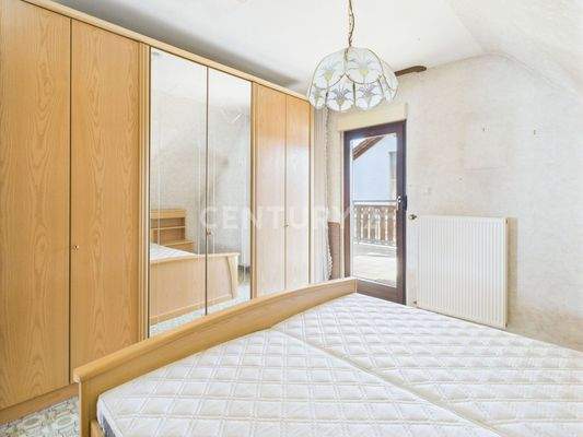 Schlafzimmer mit Balkon