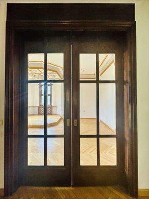 Massivholz-Schiebetür mit Glas