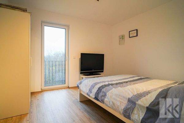 Ein weiteres Schlaf- oder Arbeitszimmer