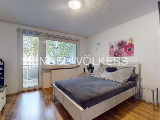 Schlafzimmer mit Zugang zur Loggia