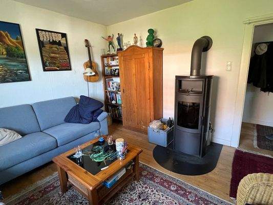 Wohnzimmer mit Kamin 1.OG