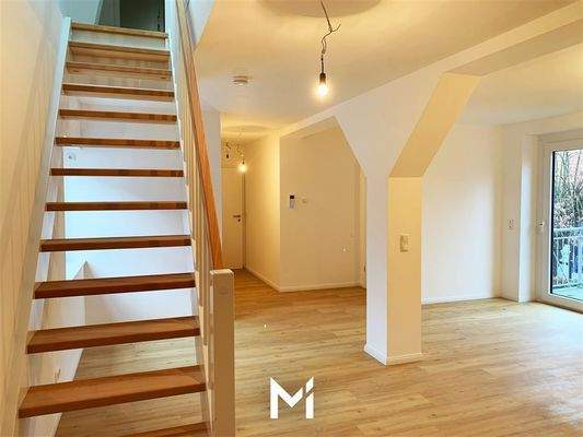 Wohnbereich mit Zugang zum Balkon