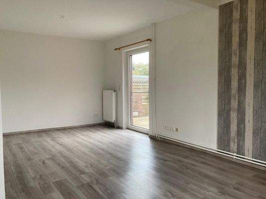 Wohnbereich mit Ausgang zur Terrasse