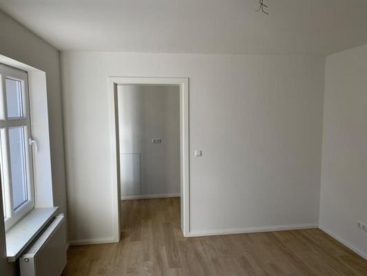 Schlafzimmer mit angrenzendem Ankleidezimmer