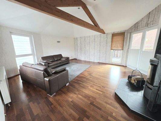 Wohnzimmer mit Kaminofen OG