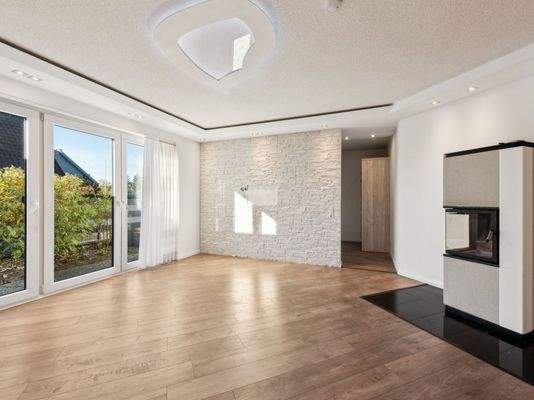 Wohnzimmer mit Kamin