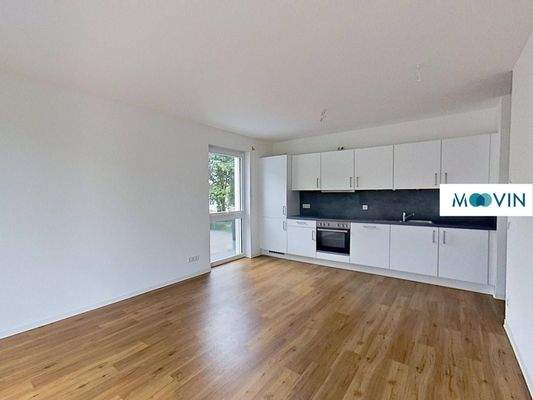 Ansicht II: Wohn- und Esszimmer mit offenem Küchenbereich