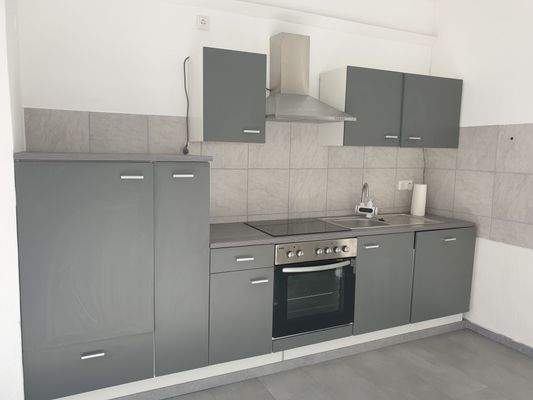 Küche mit Einbauküche