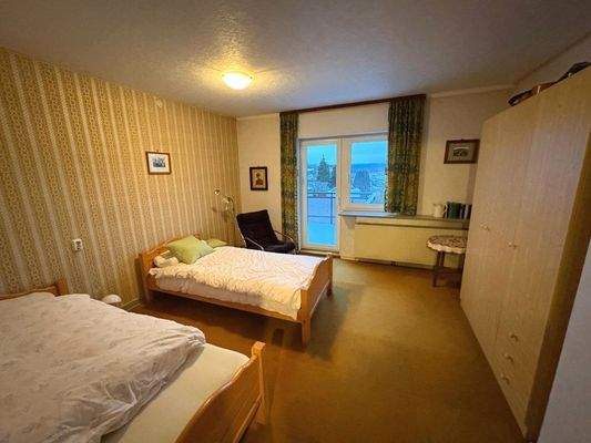 Schlafzimmer mit Balkon