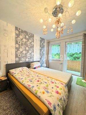 Schlafzimmer mit Balkon