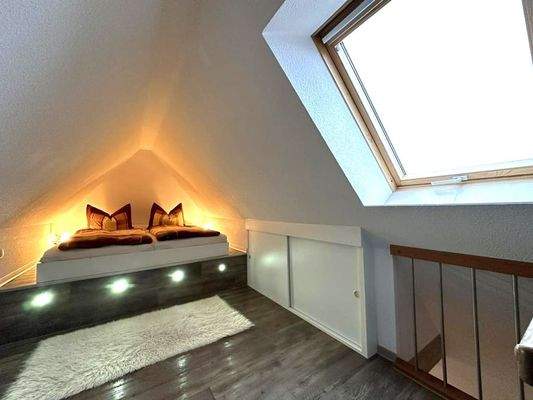 Dachgeschoss-Wohnung - Schlafzimmer unter dem Dach