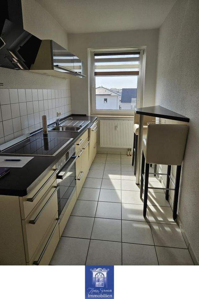 Individuell Wohnen im Dachgeschoss mit Balkon - Ruhige grüne Umgebung! - Foto 1