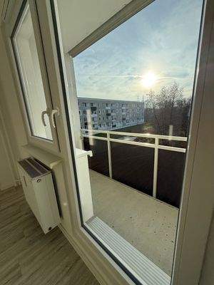 Balkonblick mit Sonne