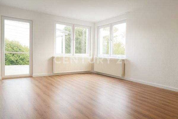 Wohnzimmer mit Ausgang Terrasse