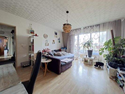 Wohn-/Essbereich mit Balkonzugang