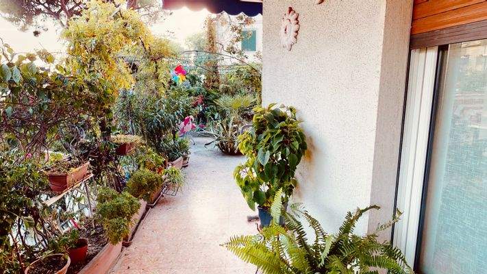 appartamento-in-vendita-Sanremo-lusso-garage-doppio-giardino-cucina-all'aperto