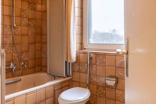 Familienidyll in Bogenhausen: Doppelhaushälfte mit sonnigem Westgarten & Grünblick