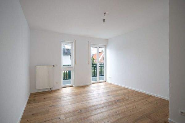 Schlafzimmer mit Balkonzugang