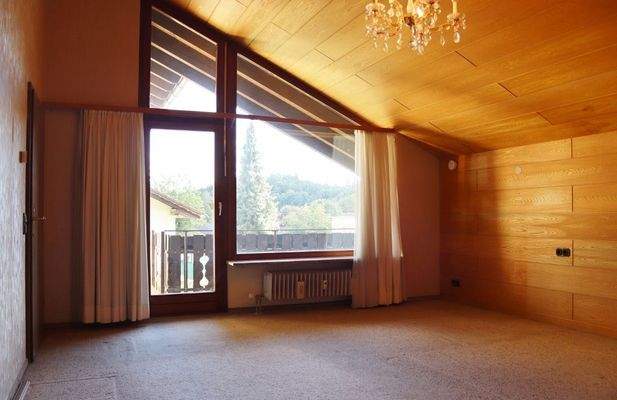 Schlafzimmer mit Balkonzugang