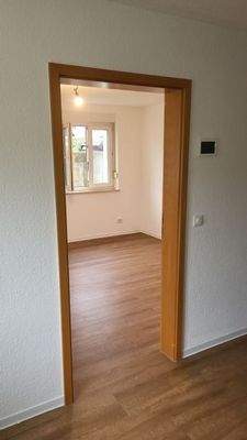 vom Wohnzimmer ins Schlafzimmer