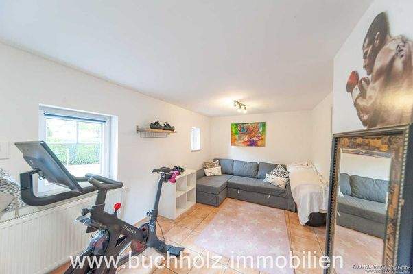 Zimmer am Nebeneingang/ Garderobe lt. Grundrissski