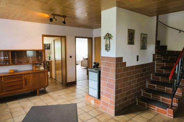 Eingangsbereich mit Kaminofen