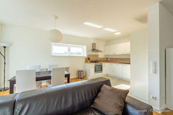 Wohnzimmer mit Küche
