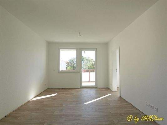 Wohnzimmer mit angrenzender Küche