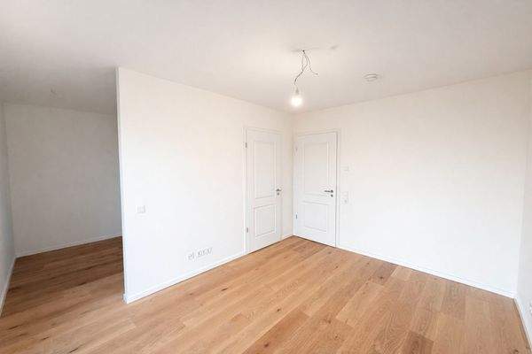 Schlafzimmer mit begehbarer Ankleide