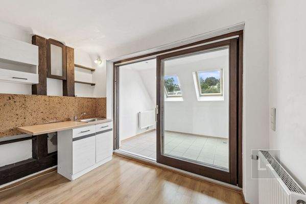 Dachgeschoss Küchenbereich mit Wintergarten