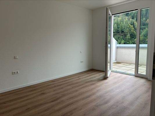 Schlafzimmer mit Zugang auf den Balkon 