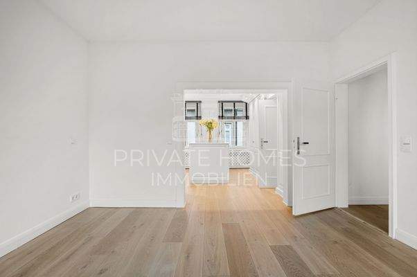 Schlafbereich mit Ankleide und Bad en Suite