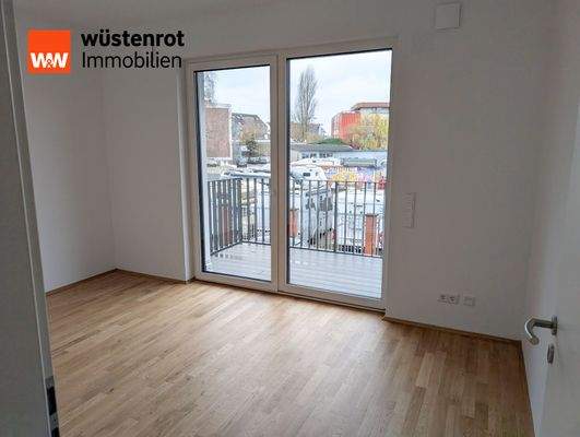 Schlafzimmer mit Balkon