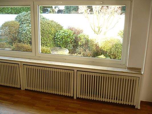 Wohnzimmer m. Gartenblick