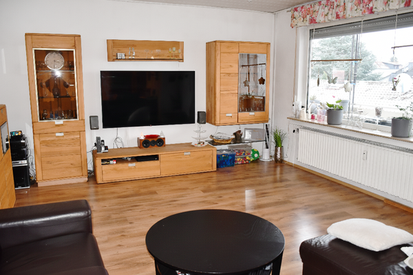 11 OG - Wohnbereich mit Balkonzugang.png