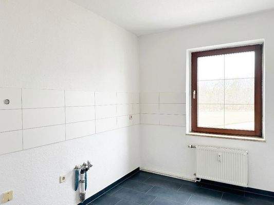 Küche mit Fliesenspiegel